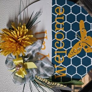 Welcome Sign with Yellow Flower and Blue Accents